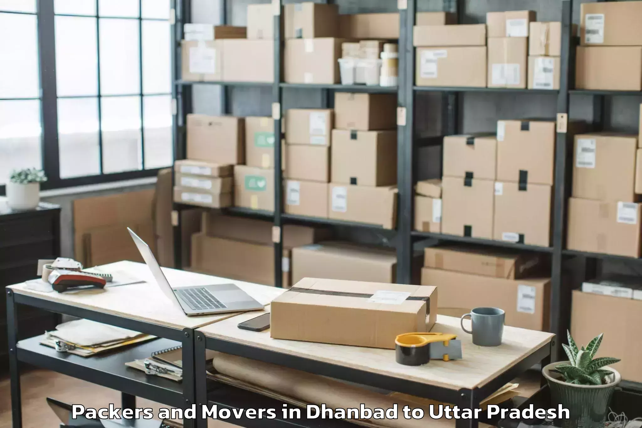 Reliable Dhanbad to Misrikh Packers And Movers